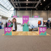 Image of 10x20 Trade Show Booth with Curved Media Wall