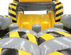 Image of Interior of yellow and gray inflatable obstacle course showing soft inflated barriers and slide section