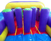 Image of Interior shot of inflatable obstacle course with tall purple pop-up obstacles on red and blue flooring