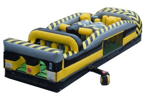 Angled front view of 7-Element Venom inflatable obstacle course rental showcasing its bold black and yellow caution design