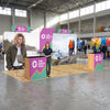 Image of 10x20 Trade Show Booth with Curved Media Wall