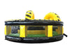 Image of Side view of Venom U-Turn inflatable obstacle course with bright yellow arches and reinforced black-and-green base