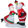 Image of Gemmy Inflatables Inflatable Party Decorations 6' Santa & Mrs. Claus Mistletoe Kissing Scene by Gemmy Inflatables 7 1/2'  Santa & Mrs. Claus Christmas Tree Scene by Gemmy Inflatables