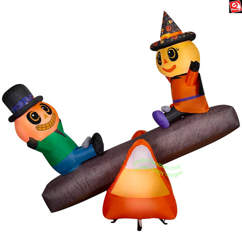 5.5' Gemmy Airblown Inflatable Animated Halloween Pumpkin Head Boy and Girl on Teeter Totter