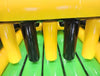Image of Close-up of interior pillars inside inflatable obstacle course showing yellow and black padded barriers
