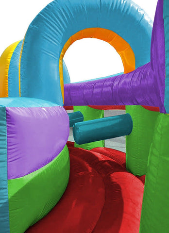 Inside view of Retro Rainbow inflatable obstacle course showing curved pathways and padded obstacles for fun play