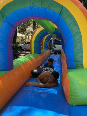 25' Rental Lite Rainbow Inflatable Splash and Ride Waterslide