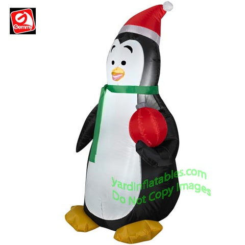 3 1/2' Penguin Wearing Santa Hat Holding Red Ornament