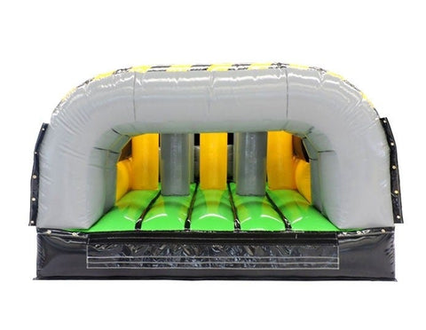 Rear view of 7-Element Venom inflatable obstacle course with gray archway and green flooring