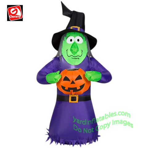 3 1/2' Witch Holding Pumpkin